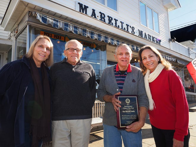 The Marelli family from left, including: Karen Raynes, Richard and Bobby Marelli, and Marcia Hannon-Buber, were awarded the Distinguished Citizen of the Year Award from the Rotary Club of Hampton, for their commitment in proudly serving downtown Hampton for 103 years.

[Rich Beauchesne/Seacoastonline]