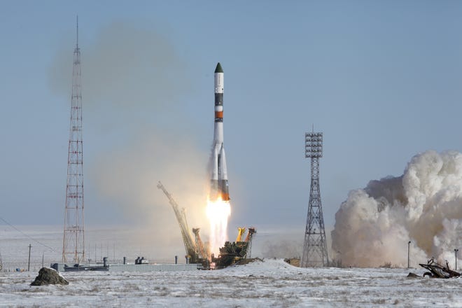 In this photo provided by the Russian Space Agency (Roscosmos) press service, a Soyuz-U booster rocket carrying the Progress MS-05 spacecraft blasts off from the Russian-leased Baikonur Cosmodrome in Kazakhstan Wednesday, Feb. 22, 2017. The unmanned Russian cargo ship lifted off successfully Wednesday on a supply mission to the International Space Station. (Russian Space Agency Roscosmos press service via AP)