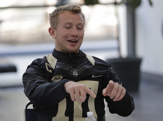 Wake Forest quarterback John Wolford passed for 2,792 yards and 25 touchdowns and ran for 10 scores this season. He's hoping to lead the Deacons to a second straight bowl victory. [Chuck Burton/The Associated Press]