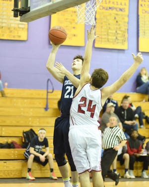 Central Valley Academy's Jacob Slaughter (left) puts up a shot during the second half of Wednesday's game against Sauquoit Valley at the West Canada Valley Sports Booster Club's holiday tournament.     

[Photo Courtesy of Bob Critser, digitalsportsphotography.net]