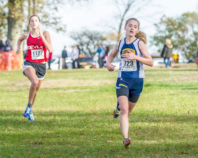Photo by Warren Westura/New Jersey Herald — After a sterling sophomore season where she was one of only four runners to break the 20-minute mark, Jefferson's Sarah DeVries, right, picked up right where she left off in 2016. She was steady in every race, running sub-20-minute times with regularly.