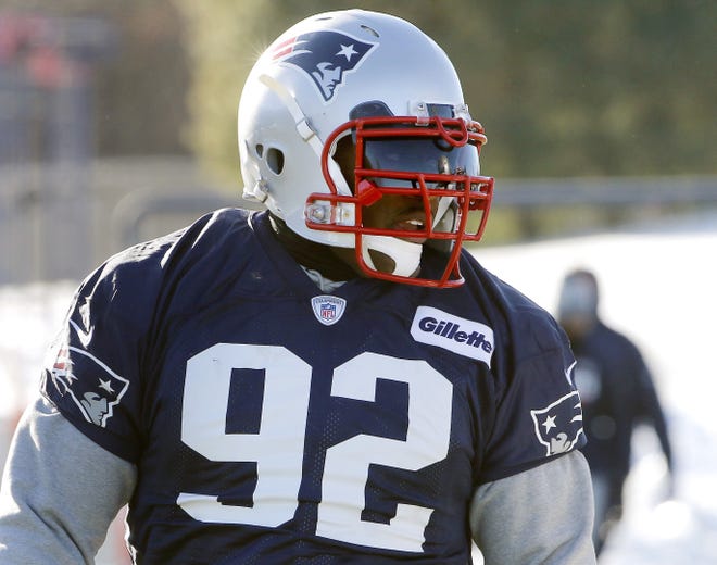 New England Patriots linebacker James Harrison runs through a drill during practice in Foxborough, Mass. The Patriots signed the 39-year-old, five-time Pro Bowl linebacker after he was released Saturday by the Pittsburgh Steelers. [Bill Sikes/AP]