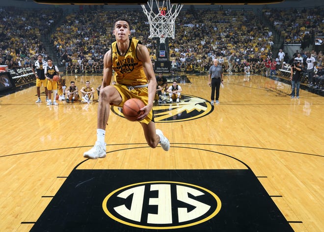 Freshman forward Michael Porter Jr. (13) changed the Missouri basketball team's prospects when he committed March 24. A back injury, however, might keep the NBA prospect off the court for the rest of the season. [Timothy Tai/Tribune]
