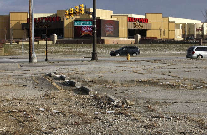 Hollywood Casino, which opened in October 2012, is the top revenue producer among the state's four casinos this year, but its economic impact on the surrounding neighborhood remains difficult to gauge. This view of the casino is from a parking lot across Georgesville Road. [Fred Squillante/Dispatch]