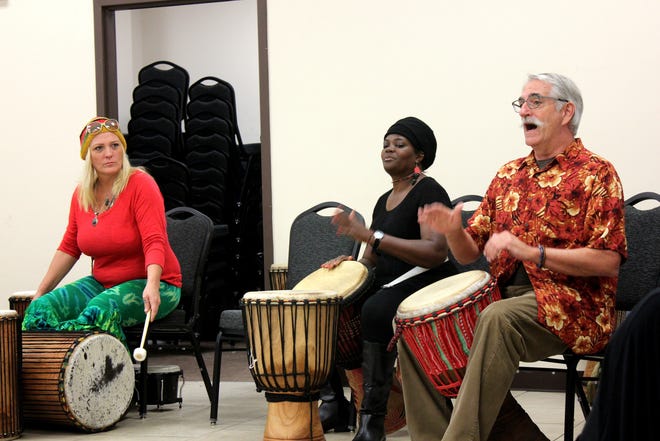 The Heritage Drum and the New Smyrna Beach Drum Tribe perform together at the 17th annual Kwanzaa Celebration at Mary S. Harrell Black Heritage Museum on Dec. 26, 2017. [Nikki Ross/Gatehouse Media]
