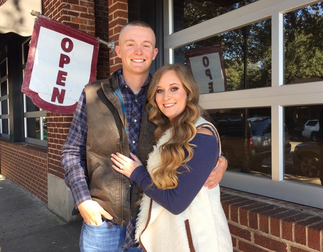 Cody Kale and fiance Taylor Auton outside Pleasant City Wood Fired Grille, where Kale proposed while on holiday leave for the Marine Corps. [Casey White/The Star]
