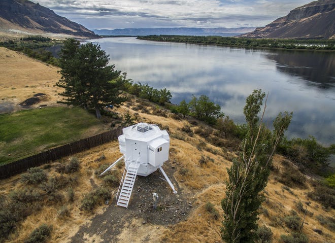 Kurt Hughes' lunar lander sits on an acre of fragile wetlands along the Columbia River in Central Washington. [Steve Ringman/Seattle Times]