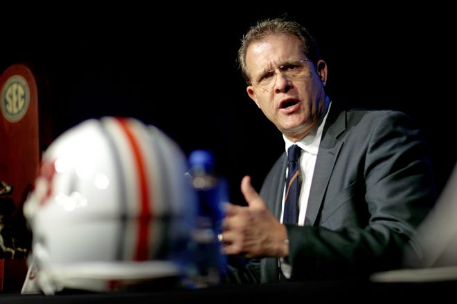 In a Friday, Dec. 1, 2017 file photo, Auburn head coach Gus Malzahn speaks during an NCAA college football news conference for the Southeastern Conference championship game against Georgia in Atlanta. (AP Photo/David Goldman, File)