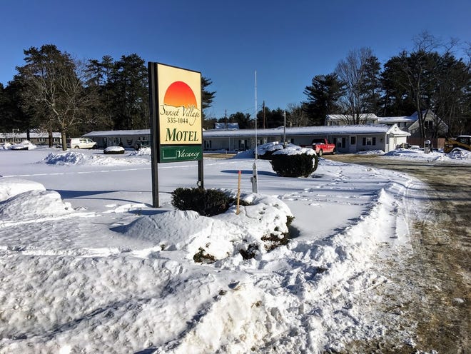 Rochester Police found a 23-year-old man's body in a snowbank below the Sunset Village Motel's sign around 11:17 a.m. Sunday. [Deb Cram/Fosters.com]