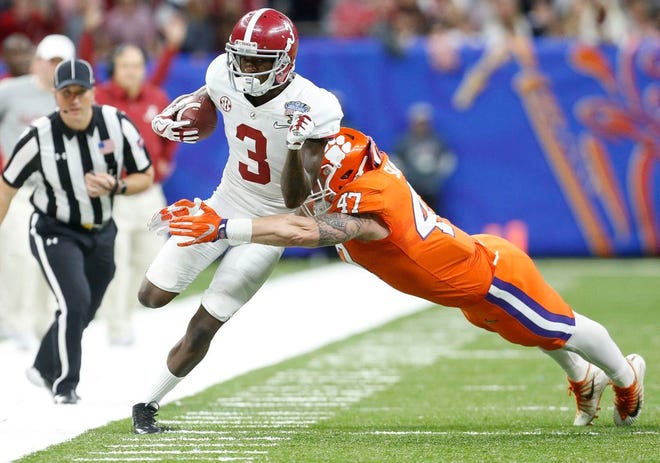 Alabama wide receiver Calvin Ridley (3) makes a first down on the sidelines as he is forced out by Clemson linebacker James Skalski (47) in the College Football Playoff Semifinal in the Sugar Bowl at the Mercedes-Benz Superdome Monday, Jan. 1, 2018. [Staff Photo/Gary Cosby Jr.]
