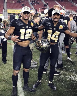 Dutchtown alum Jared Sparks (left) celebrates with his Purdue teammates after the Boilermakers' 38-35 bowl win over Arizona. Photo courtesy of Twitter.
