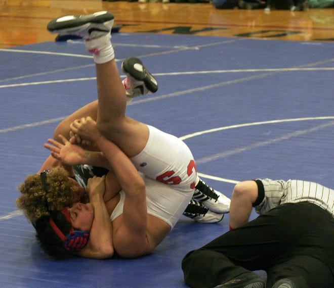 Addison's Colby Jones pins his opponent at 160 pounds Tuesday. [SHAWN VARGO/THE LEADER]