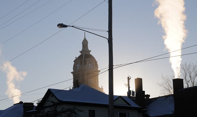As the bitter cold snap continues across the country, people are doing their best to stay warm. Furnaces are working overtime, keeping people somewhat comfortable. Here, steam rises from chimneys in the downtown Cambridge area as the temperature reached an almost unbearable minus-12 degrees Wednesday morning.