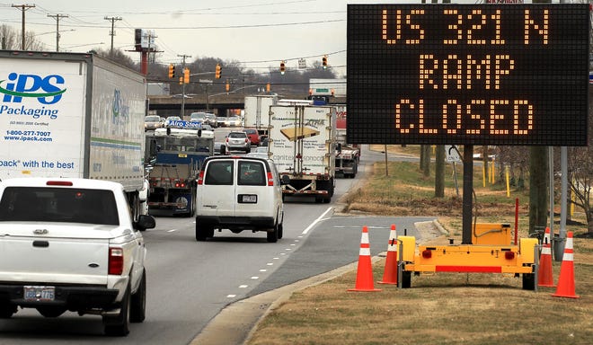 A sign alerts motorists that the on ramp to Interstate 85 North off US 321 South is closed due to possible damage to the overpass. [JOHN CLARK/THE GASTON GAZETTE]