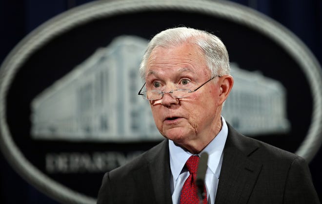 FILE - In this Dec. 15, 2017, file photo, United States Attorney General Jeff Sessions speaks during a news conference at the Justice Department in Washington. Attorney General Jeff Sessions is going after legalized marijuana. Sessions is rescinding a policy that had let legalized marijuana flourish without federal intervention across the country. That's according to two people with direct knowledge of the decision. (AP Photo/Carolyn Kaster, File)