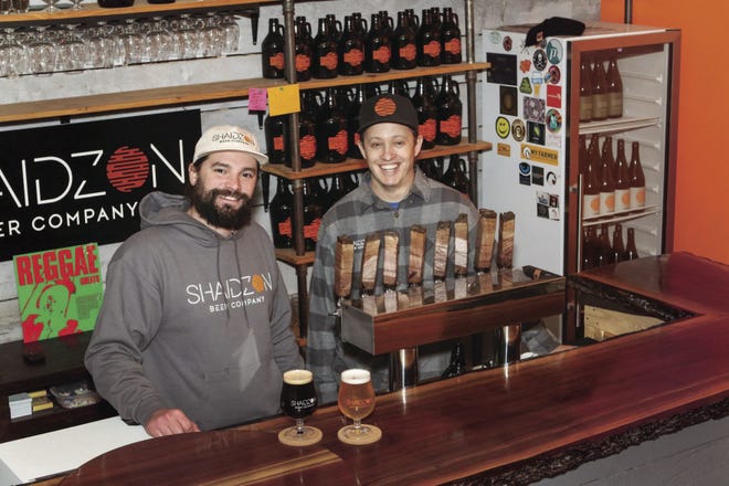 Josh Letourneau, left, and Chip Samson are co-owners of the new Shaidzon Beer Co. in West Kingston. They are pictured here at the brewery’s bar.