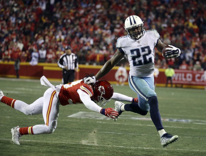 Tennessee Titans running back Derrick Henry (22) runs past Kansas City Chiefs defensive back Ron Parker (38) for a 35-yard touchdown run, during Tennessee's 22-21 win in an AFC wild-card playoff game on Saturday in Kansas City, Mo. [The Associated Press]