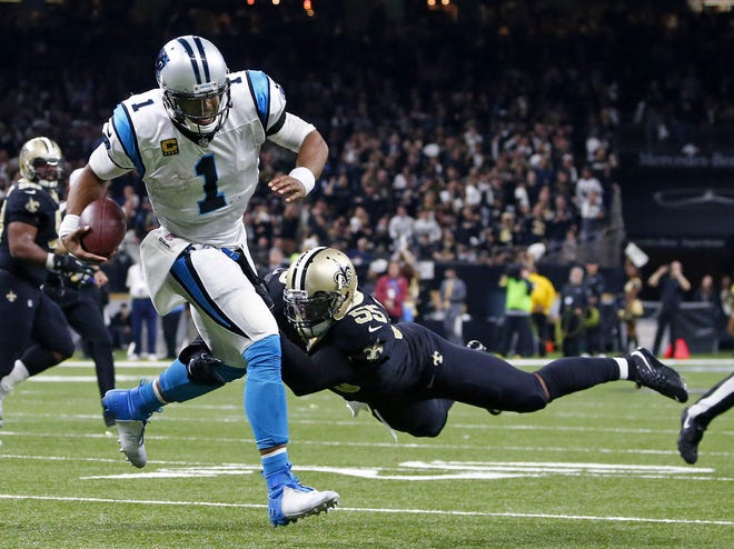 New Orleans Saints linebacker Jonathan Freeny (55) sacks Carolina Panthers quarterback Cam Newton (1) on a third down, forcing the Panthers to kick a field goal, in the second half of an NFL football game in New Orleans, Sunday, Jan. 7, 2018. (AP Photo/Butch Dill)
