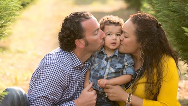 Suchan Rosenberg and Matthew Rosenberg with their son, Ethan, who has been diagnosed with a rare degenerative disease called SPG47.