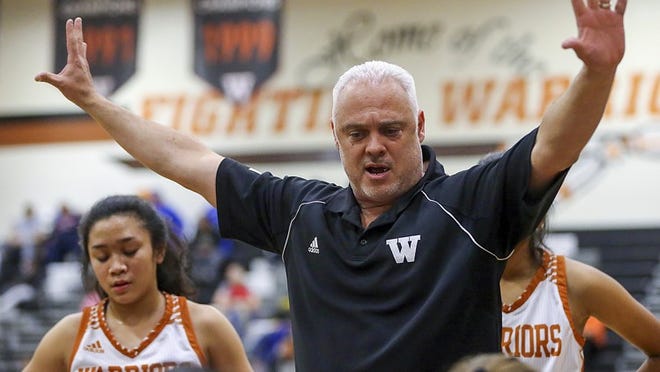 Westwood head varsity girls basketball coach Doug Davalos talks to his team between quarters against Pflugerville in the Warrior’s gym on Tuesday, December 12, 2017. JAMIE HARMS / FOR AMERICAN-STATESMAN