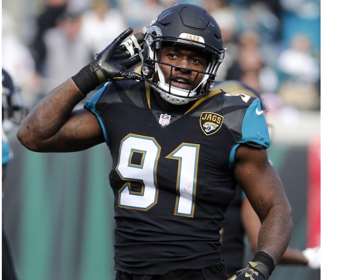 Jacksonville's Yannick Ngakoue stood by his accusation of racial slurs used by a Buffalo player during Sunday's playoff game. [AP Photo/Stephen B. Morton]