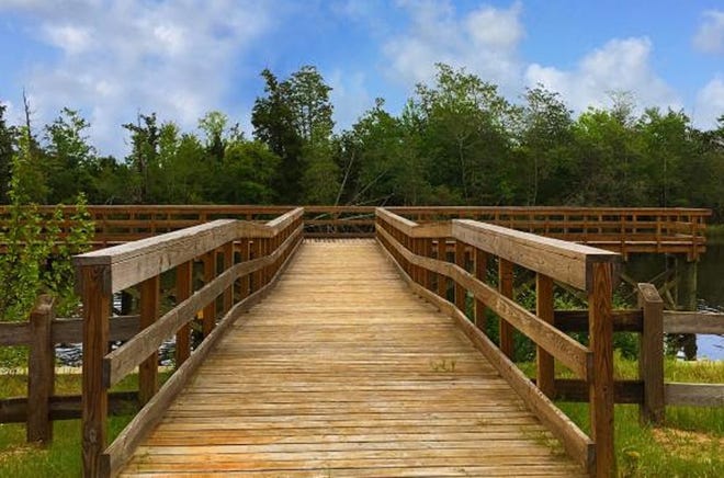The handicap-accessible fishing pier at Bagdad Mill Site Park. [Special to the Daily News]