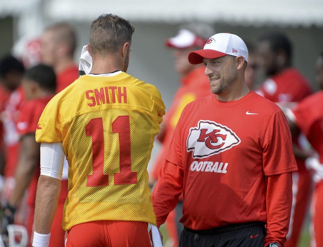 Kansas City Chiefs quarterback Alex Smith talks with quarterbacks coach Matt Nagy at NFL football training camp in St. Joseph, Mo. Chicago Bears general manager Ryan Pace announced the hiring of Matt Nagy as the NFL football team's 16th head coach Monday, Jan. 8, 2018. Nagy helped Alex Smith lead the NFL with a 104.7 passer rating this year. [ANDREW CARPENEAN/THE ST. JOSEPH NEWS-PRESS]