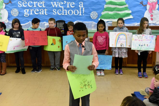 Second-grader Maurice Barber, 8, recites the Rev. Martin Luther King Jr.'s "I Have a Dream" speech during the annual celebration of King's birthday at the Elias Boudinot Elementary School in Burlington City on Friday, Jan. 12, 2018. [CARL KOSOLA / STAFF PHOTOJOURNALIST]