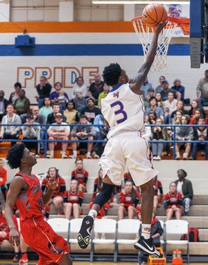 Lexington's Nasheed Peoples scores an easy basket against Central Davidson on Tuesday night. [Michael Coppley for The DIspatch]