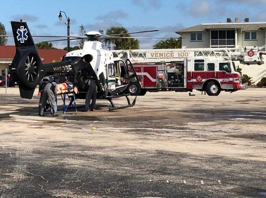 A construction worker who was shocked while working in the electrical room at Village on the Isle Jan. 9, 2018, is loaded onto a Bayflite helicopter. [Provided by City of Venice]