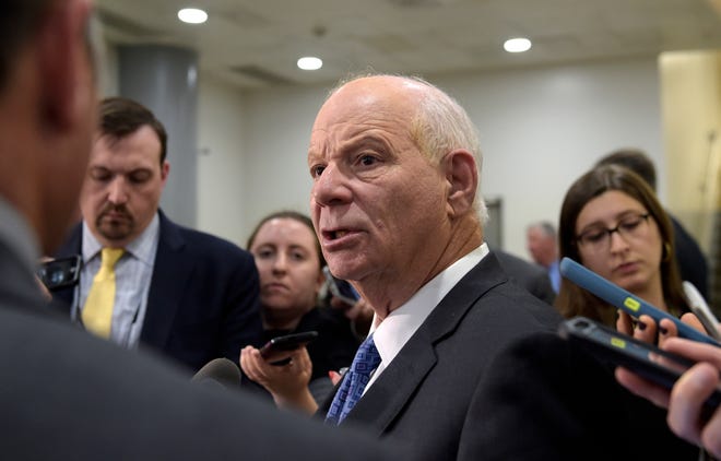 FILE - In this April 7, 2017, file photo, Sen. Ben Cardin, D-Md., speaks to reporters on Capitol Hill in Washington. A sweeping new report by congressional Democrats warns of deepening Russian interference throughout Europe and concludes that even as some Western democracies have responded with aggressive counter-measures, President Donald Trump has offered no strategic plan to bolster their efforts or safeguard the U.S. from again falling victim to the Kremlin’s systematic meddling. The 200-plus page report released by Cardin, the ranking Democrat on the Senate Foreign Relations Committee, comes without sign-off from Republicans on the panel.(AP Photo/Susan Walsh, File)