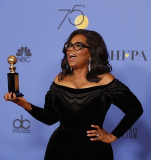 Oprah Winfrey backstage at the 75th Annual Golden Globes Sunday at the Beverly Hilton Hotel in Beverly Hills, California. [Allen J. Schaben/Los Angeles Times]