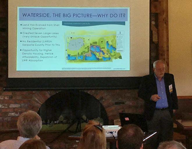 Schroeder-Manatee Ranch CEO Rex Jensen outlines the major characteristics of SMR's new Waterside development on Wednesday, Jan. 10, to members of the development and real estate industries at the Sarasota Polo Club in Lakewood Ranch.  [Herald-Tribune staff photo / Chris Wille]