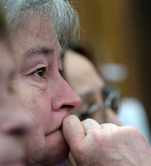 Margaret Krukowski, widow of William C. Krukowski, has tears in her eyes Thursday during proceedings in Dudley District Court. [T&G Staff/Christine Peterson]