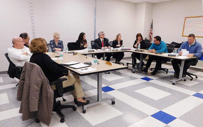 Clockwise from left foreground are Frankfort-Schuyler school board members Kathy Sarafin, Dominick Bellino, board Vice President Joseph Ciccone, board clerk Connie Giordano, board President Lisa Morgan, Superintendent Robert Reina and board members Angela Service, Jack Bono and Michael Clements. [DONNA THOMPSON/TIMES TELEGRAM]