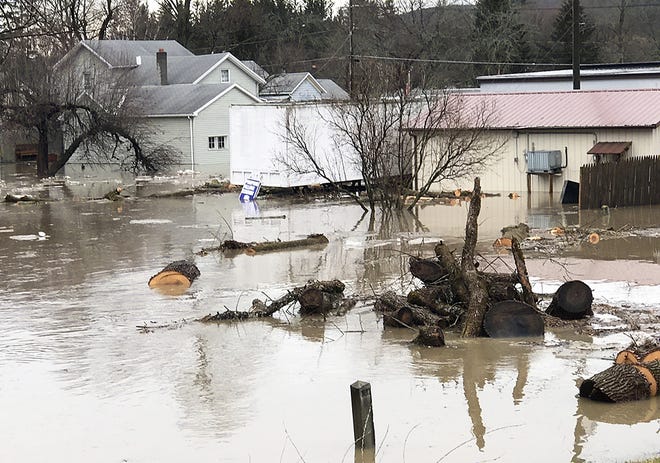 A large ice jam on the Conhocton River backed up water and sent it into the hamlet of Campbell. [ERIC WENSEL/THE LEADER]