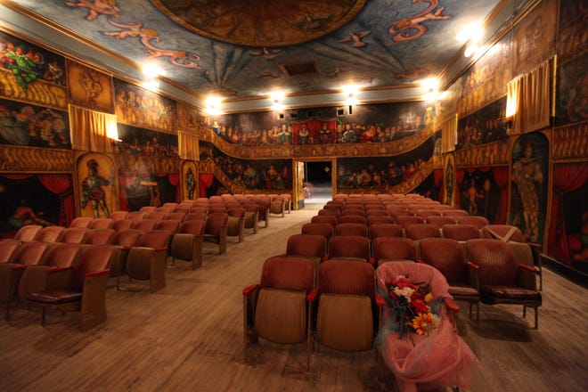 Before a performance, the Amargosa Opera House is filled only with the characters from the murals painted by Marta Becket, Death Valley Junction, California. [Steve Stephens]