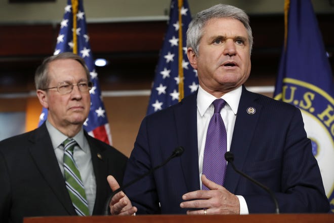 House Judiciary Committee Chairman Rep. Bob Goodlatte, R-Va., left, listens as House Homeland Security Committee Chairman Rep. Michael McCaul, R-Texas, speaks during a news conference on their immigration bill, Wednesday, Jan. 10, 2018, on Capitol Hill in Washington. (AP Photo/Jacquelyn Martin)