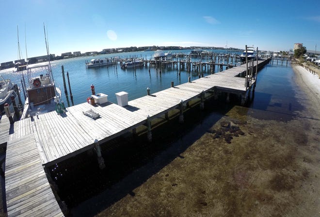 Fort Walton Beach is considering opening a municipal marina at the site now used by Legendary Marine across from Captain D's on U.S. Highway 98. [NICK TOMECEK/DAILY NEWS]