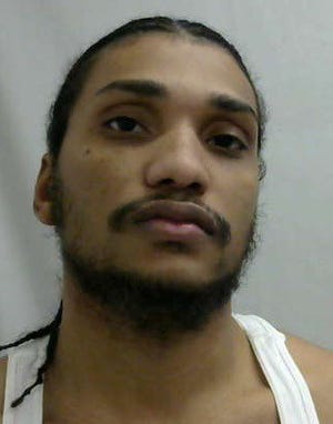 Aderito Amado, 27, of Brockton, was arrested on gun charges after an Easton traffic stop Monday, Easton Police said.
