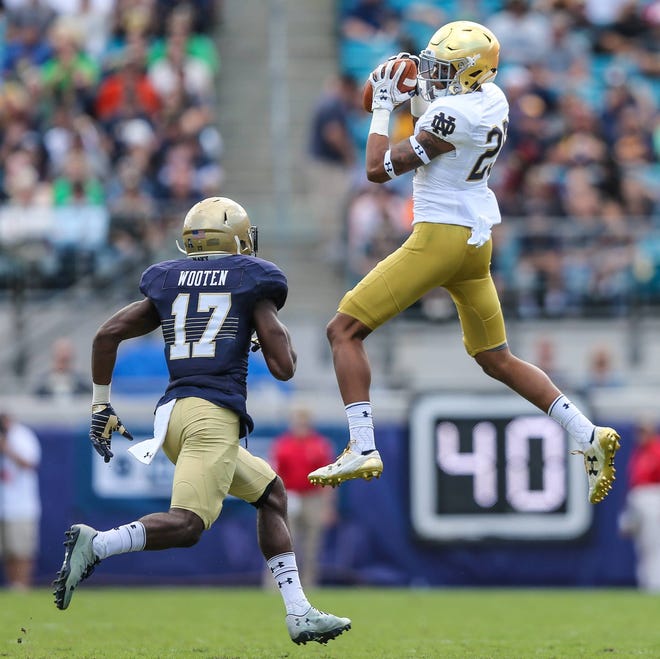 Notre Dame wide receiver Kevin Stepherson (29) catches a pass against Navy at EverBank Field in 2016. Stepherson, a former First Coast High School standout, was dismissed from the Notre Dame program Tuesday. (For The Florida Times-Union/Gary McCullough)