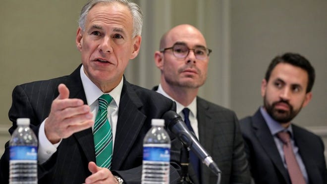 Gov. Greg Abbott, from left, state Rep. Dennis Bonnen, R-Angleton, and David Garcia, a Harris County homeowner, are seen during a news conference Tuesday at the Westin Galleria Hotel in Houston. Jon Shapley / Houston Chronicle