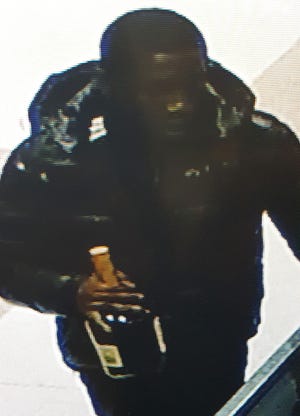 The Evesham police are looking for this man, who allegedly used a fake credit card to buy "high-end" liquor on Jan. 11. [COURTESY OF THE EVESHAM POLICE DEPARTMENT]