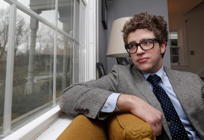 David Lucas, Ohio's newest poet laureate, poses for a photo in his home in Cleveland Heights.