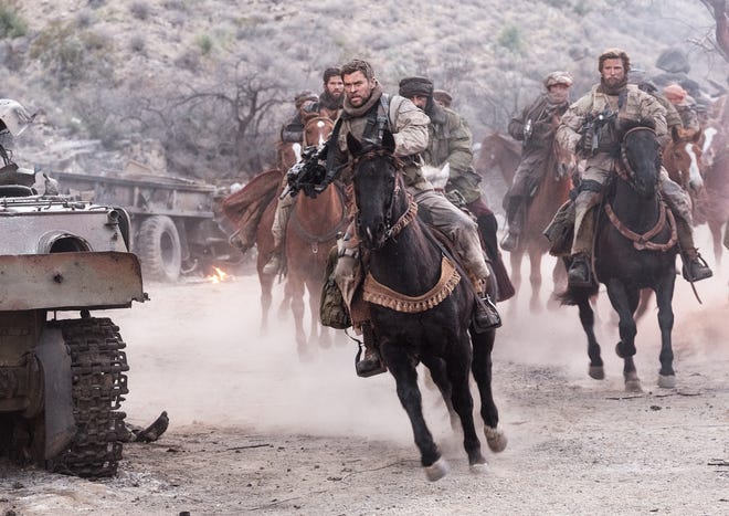 Chris Hemsworth as Captain Mitch Nelson in the war drama "12 Strong." [Warner Bros. Pictures]