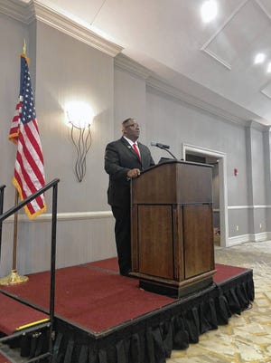 Rep. Carl Gilliard speaks during the monthly Tourism Leadership Council luncheon on Thursday. Gilliard recapped several legislative initiatives he supports this year, including a bill that would penalize people for supplying guns to felons. (Katie Nussbaum/Savannah Morning News)