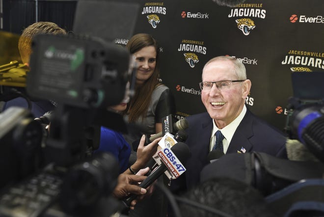 Tom Coughlin talks with members of the media after a press conference where he was introduced as the team's executive vice president of football operations on Jan. 12, 2017, in Jacksonville. [Bob Self / The Florida Times-Union via AP, File]
