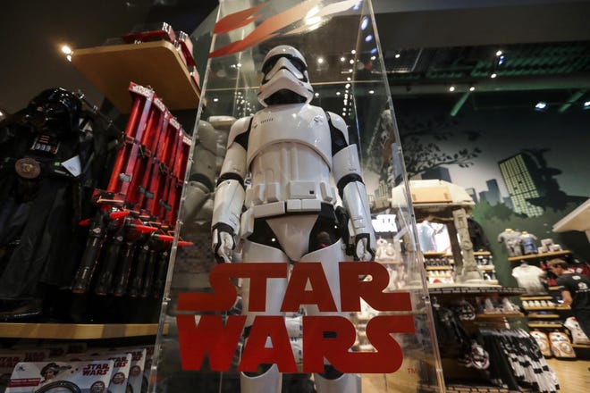 A model Storm Trooper stands on display at the Walt Disney Co. store in New York on Sept. 1. [JEENAH MOON/BLOOMBERG]