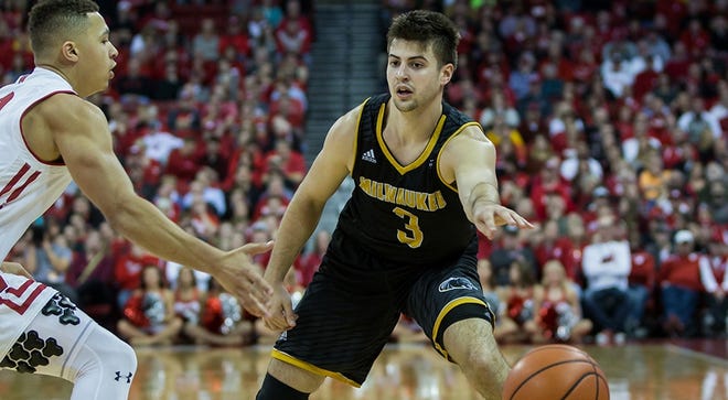 Former Boylan star Brock Stull passes the ball during a recent University of Wisconsin-Milwaukee game. Stull leads the team in scoring, but he and the Panthers are slumping in 2018. [PHOTO PROVIDED]