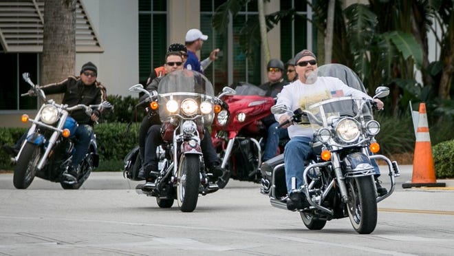 Hundreds of bikers leave from Wellington’s Village Hall on Saturday morning for a ride to raise money for Crime Stoppers rewards on January 20, 2018. (Allen Eyestone / The Palm Beach Post)